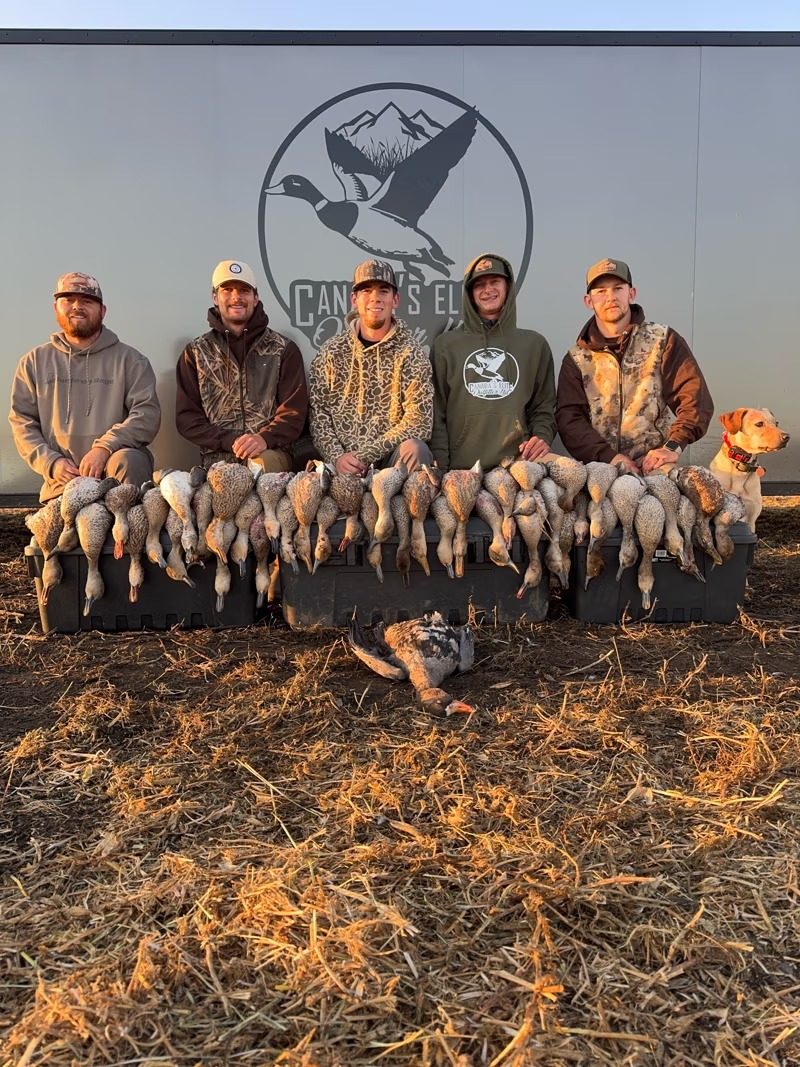 Hunting group with a morning's harvest, Canada's Elite Outfitter
